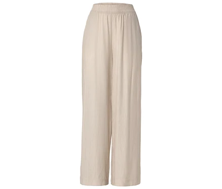 Beige, weite Stoffhose mit elastischem Bund.