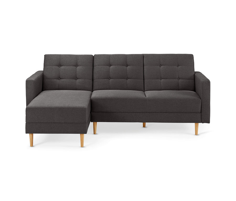 Dunkelgraues Federkern-Eckschlafsofa »Just Relax« mit Stauraumbank und getufteten Rückenlehnen auf Holzfüßen.