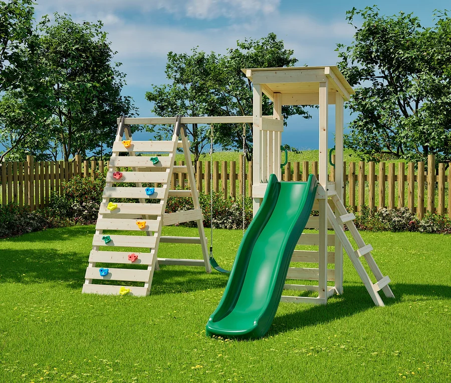 Spielplatz mit Rutsche und Kletterwand auf einer Wiese. Im Hintergrund ein weka Spielturm »Sevilla«.