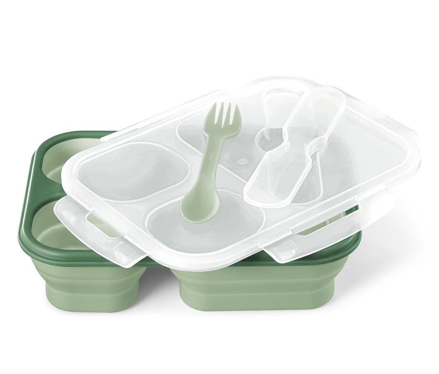 Eine grüne faltbare Lunchbox mit transparentem Deckel und grüner Gabel.