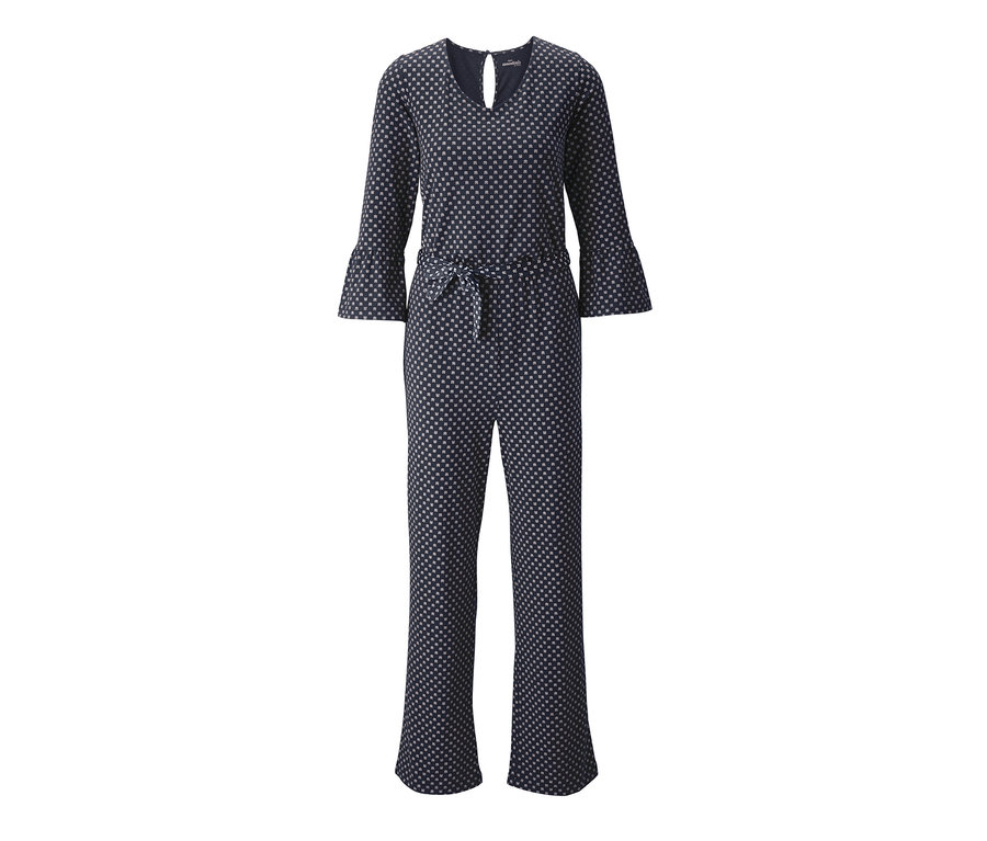 Ein marineblauer Jumpsuit mit Volantärmeln und Muster.