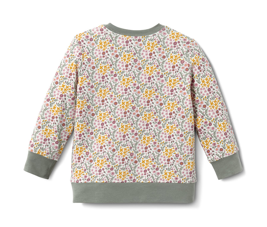 Detailansicht eines Pyjamas mit Blumenmuster.