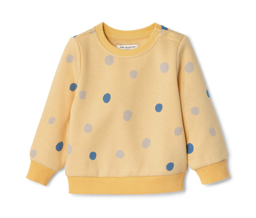 Gelbes Kleinkind-Sweatshirt mit blauen und grauen Punkten.
