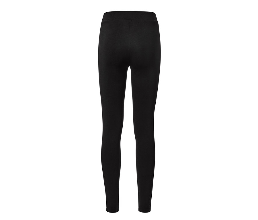 Schwarze Leggings im Materialmix, von hinten gezeigt.