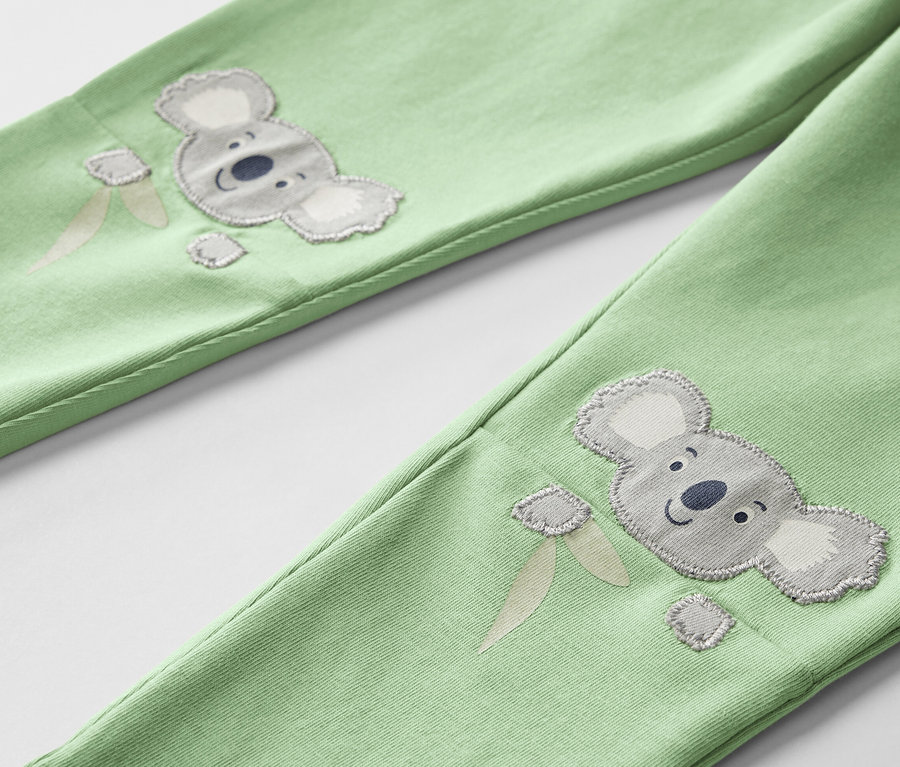 Zwei Kinderleggings mit Koala- und Eismotiv.