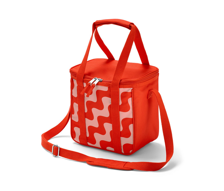 Eine rote Kleine Kühltasche mit weißem Wellenmuster.