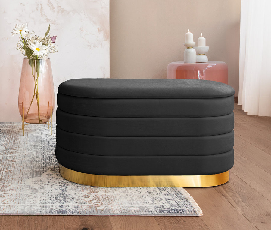 Schwarze Kayoom Sitzbank »Adina« mit Blumen in Vase.