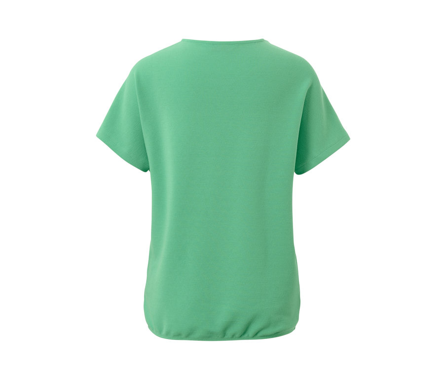 Grünes Blusenshirt mit kurzen Ärmeln.