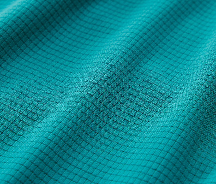 Detailaufnahme einer türkisen Funktionsshorts.