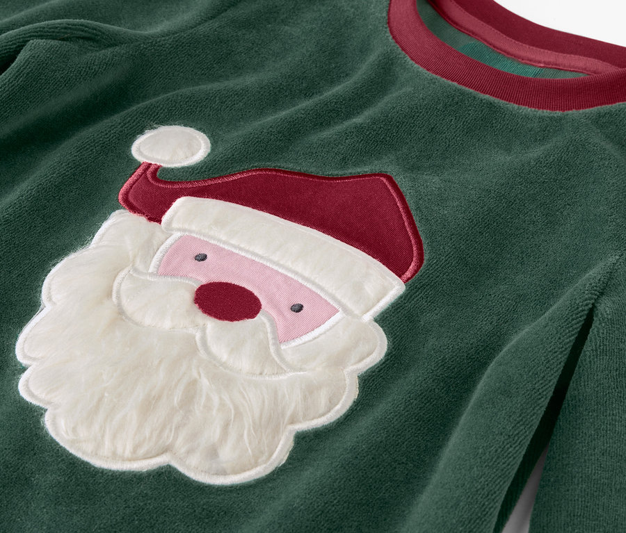 Grüner Weihnachtspullover mit Santa Claus Applikation.