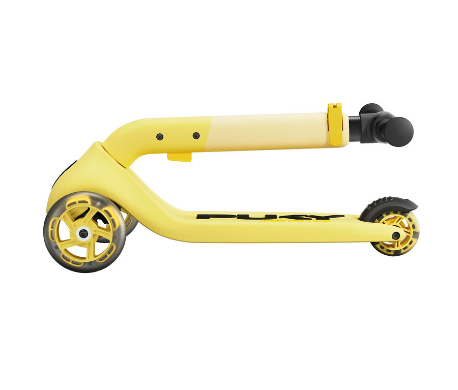 Ein gelber PUKY Roller PUSH liegt auf der Seite.