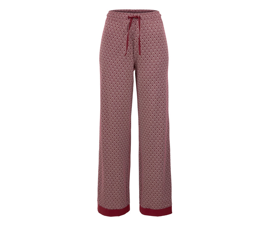 Eine weinrote Pyjamahose mit Muster.