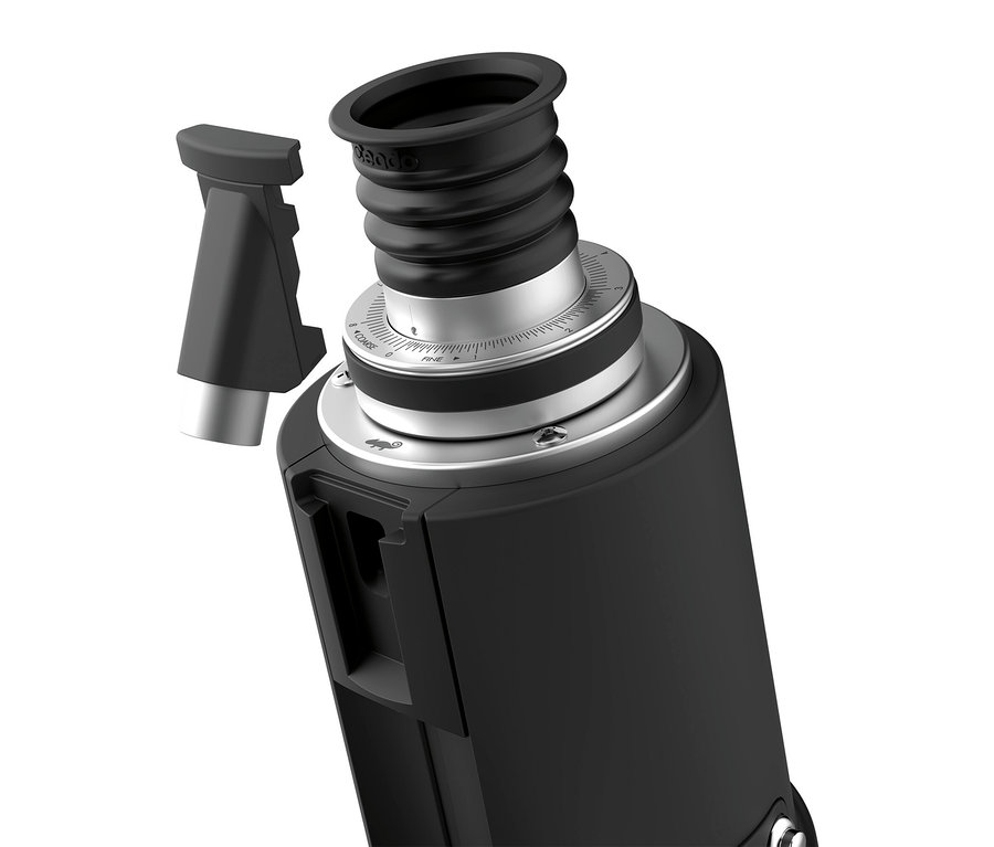 Nahaufnahme einer schwarzen Kaffeemühle mit abnehmbarem Griff und einstellbarer Mahlgradeinstellung.