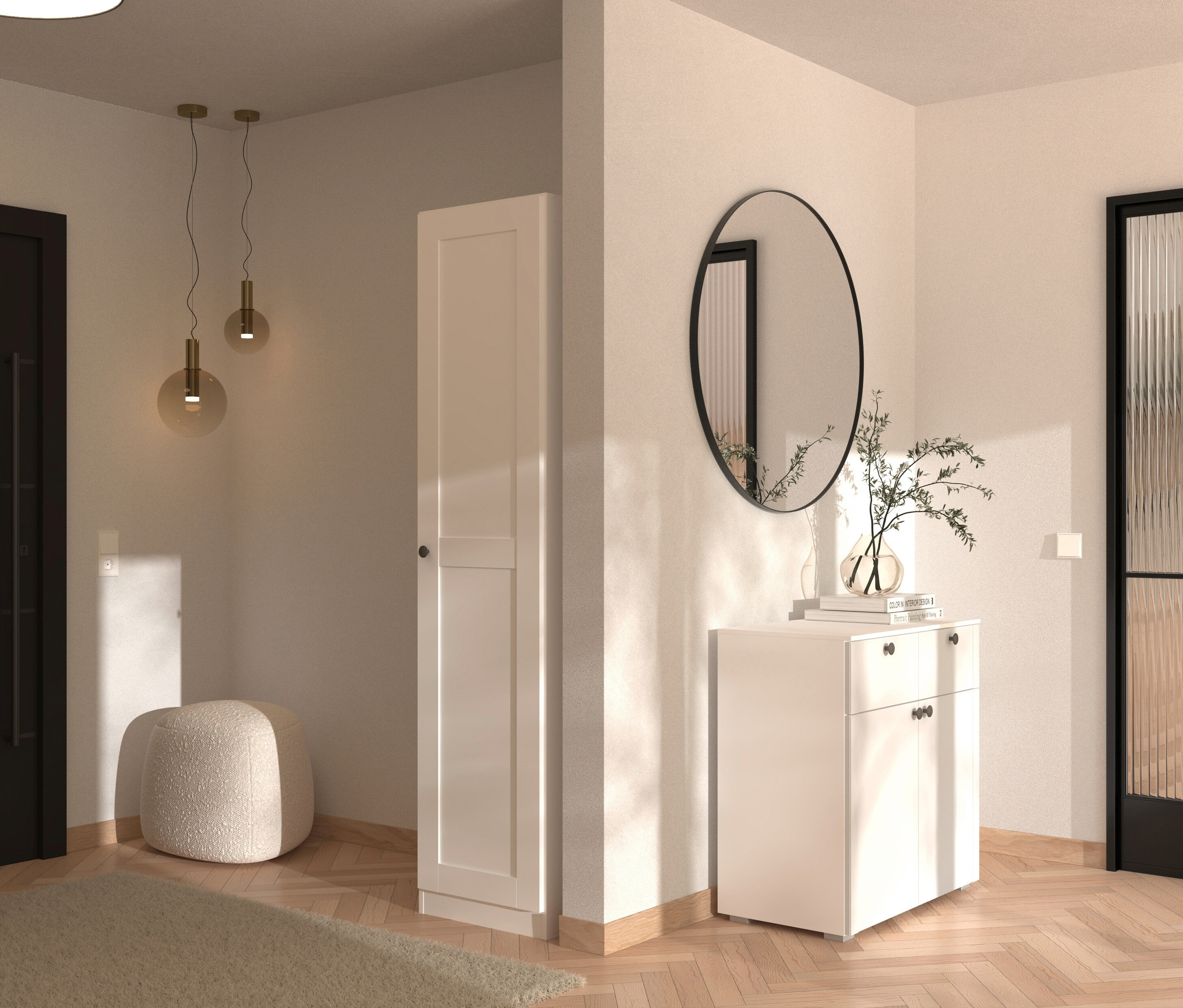 Ein Flur mit einem weißen Schuhschrank unter einem runden Spiegel, neben einer weißen Tür und einem schwarzen Türrahmen.