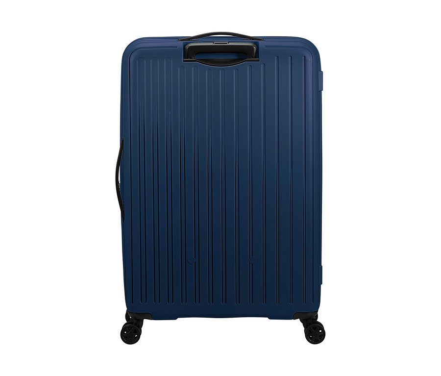 Großer, marineblauer American Tourister Rejoy Spinner Koffer mit vertikalen Rillen, schwarzen Griffen und vier Rollen.