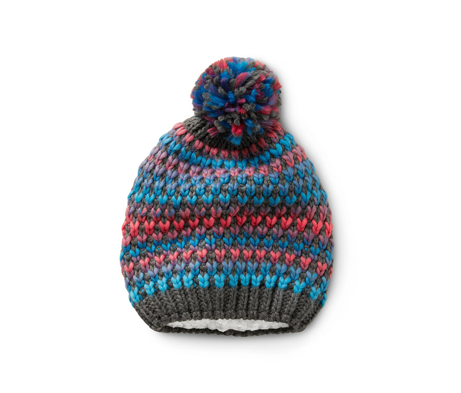 Eine Strickmütze mit Bommel in den Farben Blau, Pink und Grau.