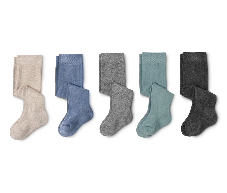 Fünf Strumpfhosen in verschiedenen Farben.