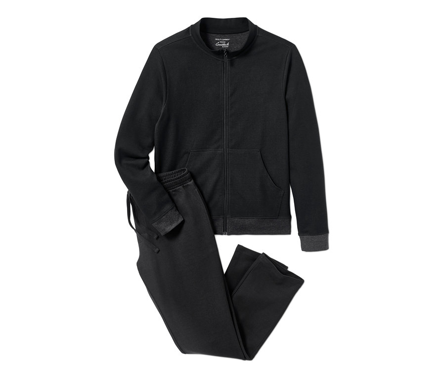Ein schwarzer Hausanzug mit Reißverschluss und Hose.