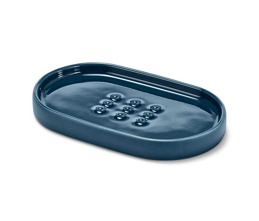 Blaue Seifenschale in ovaler Form.