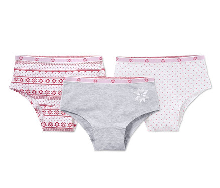 Drei Pantys: eine rosa mit roten Mustern, eine graue mit Schneeflocke und eine weiße mit rosa Punkten.