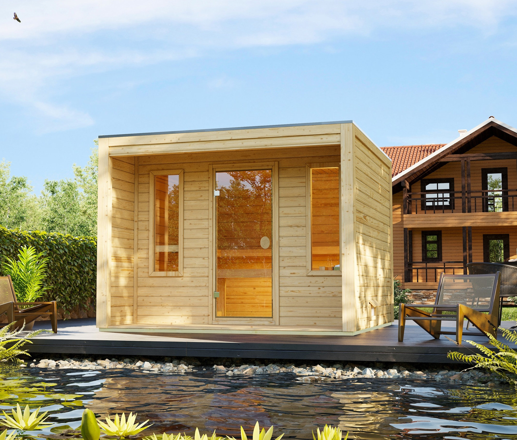 Außenansicht des Karibu Saunahauses »Celie« mit Bio-Ofen an einem Teich.