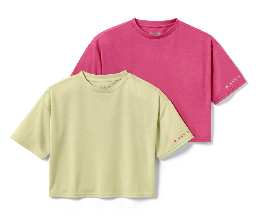 Zwei Kinder-Sportshirts, hellgrün und pink.
