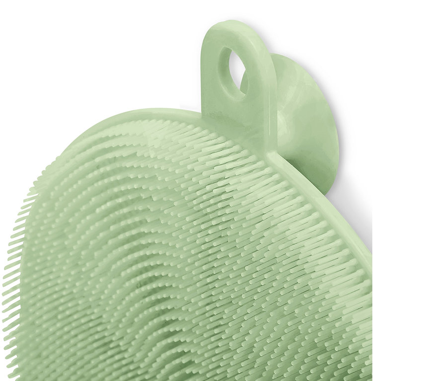 Nahaufnahme eines hellgrünen Silikon-Abwaschpads.