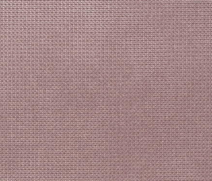 Nahaufnahme des Stoffs des rosafarbenen DOMO Sessels mit Drehfunktion.