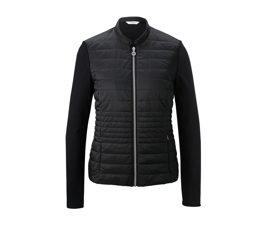 Schwarze Jacke im Materialmix.