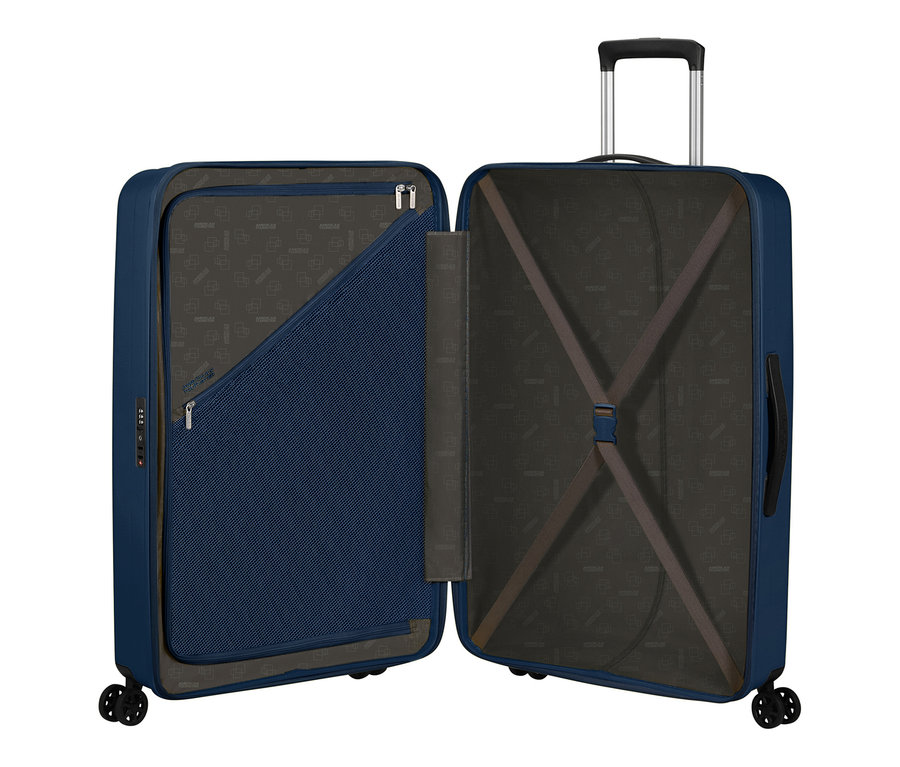 Offener, großer American Tourister Rejoy Spinner Koffer in Navy Blue mit Reißverschluss-Netzfach und Packgurten.