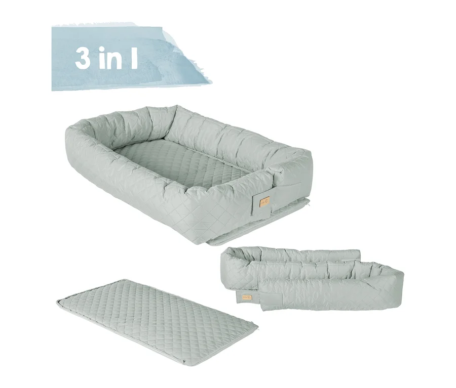 Darstellung von drei verschiedenen Konfigurationen der grünen 3-in-1 Babylounge von Roba.