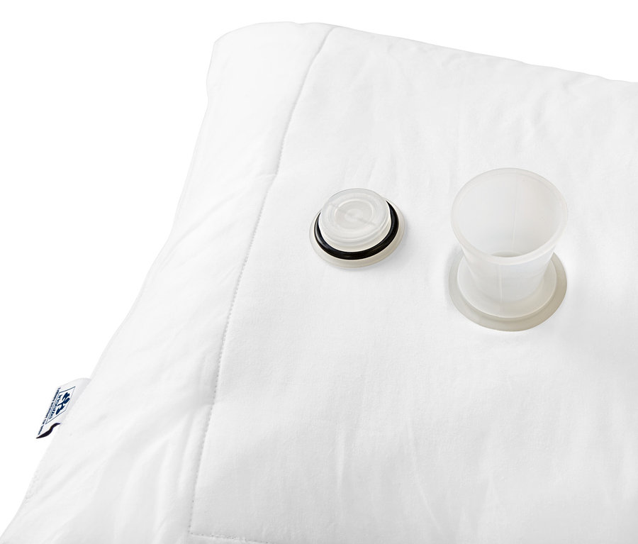 Detailansicht eines weißen irisette® Wasserkissens mit Füllventilen.