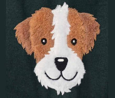 Detailansicht eines Kleinkinder-Langarmshirts mit Hundeapplikation.