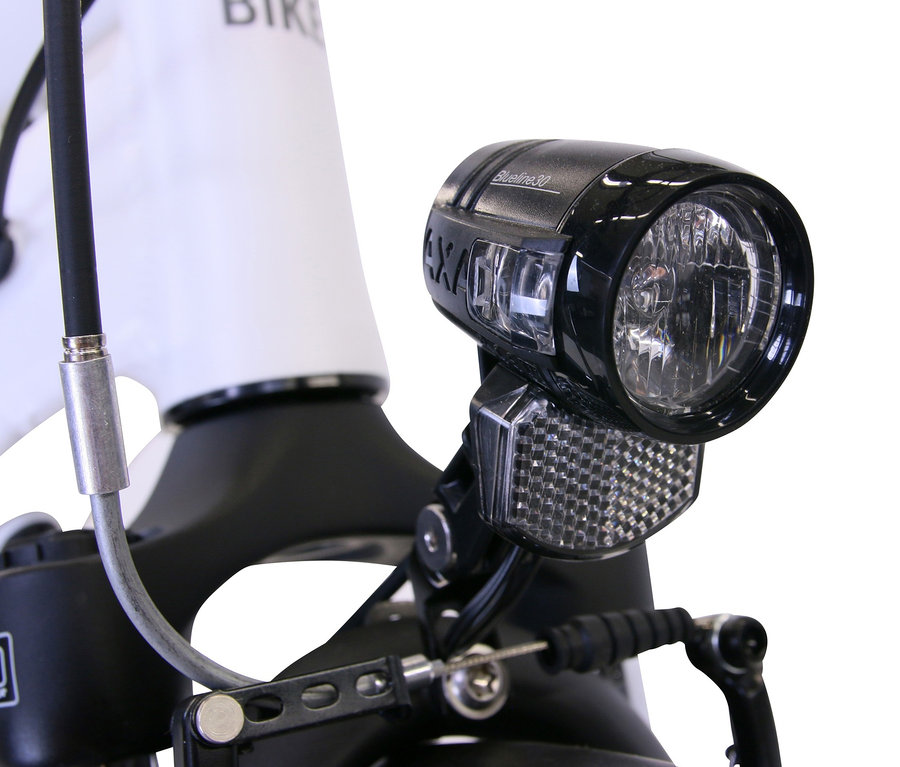 Nahaufnahme des Frontlichts von einem grauen HAWK Bikes E-Bike Damen »e-Trekking Lady BAFANG«.