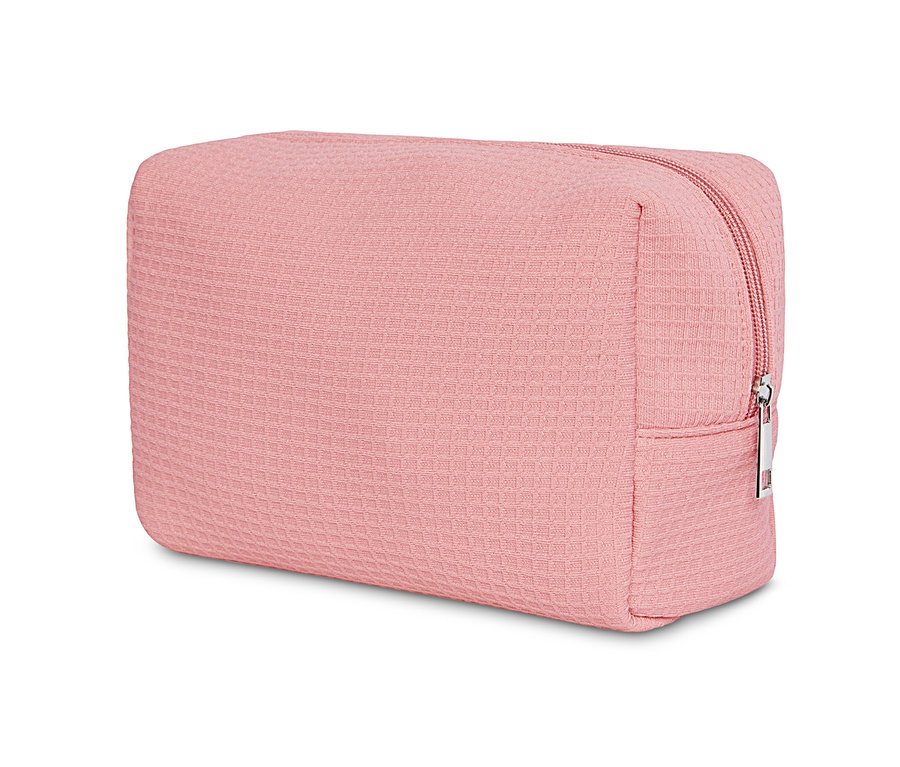 Eine rosa Kulturtasche mit silbernem Reißverschluss.