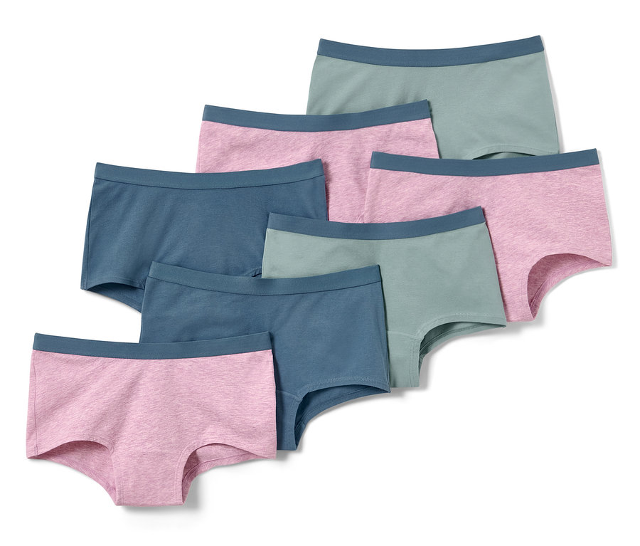 Sieben Mädchen-Pantys in verschiedenen Farben.