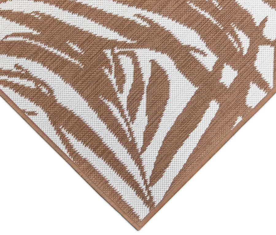 Detail eines braunen Outdoor-Wendeteppichs "Palm Tree".