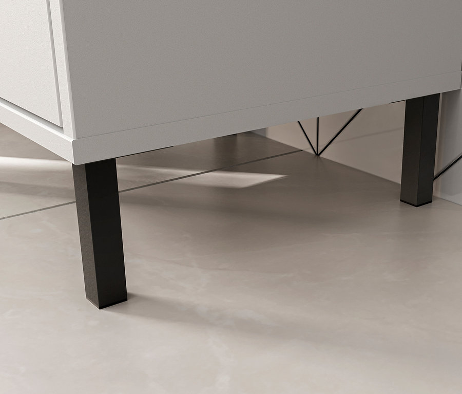 Detail eines Waschbeckenunterschranks »Loria« mit schwarzen Beinen auf beigem Untergrund.