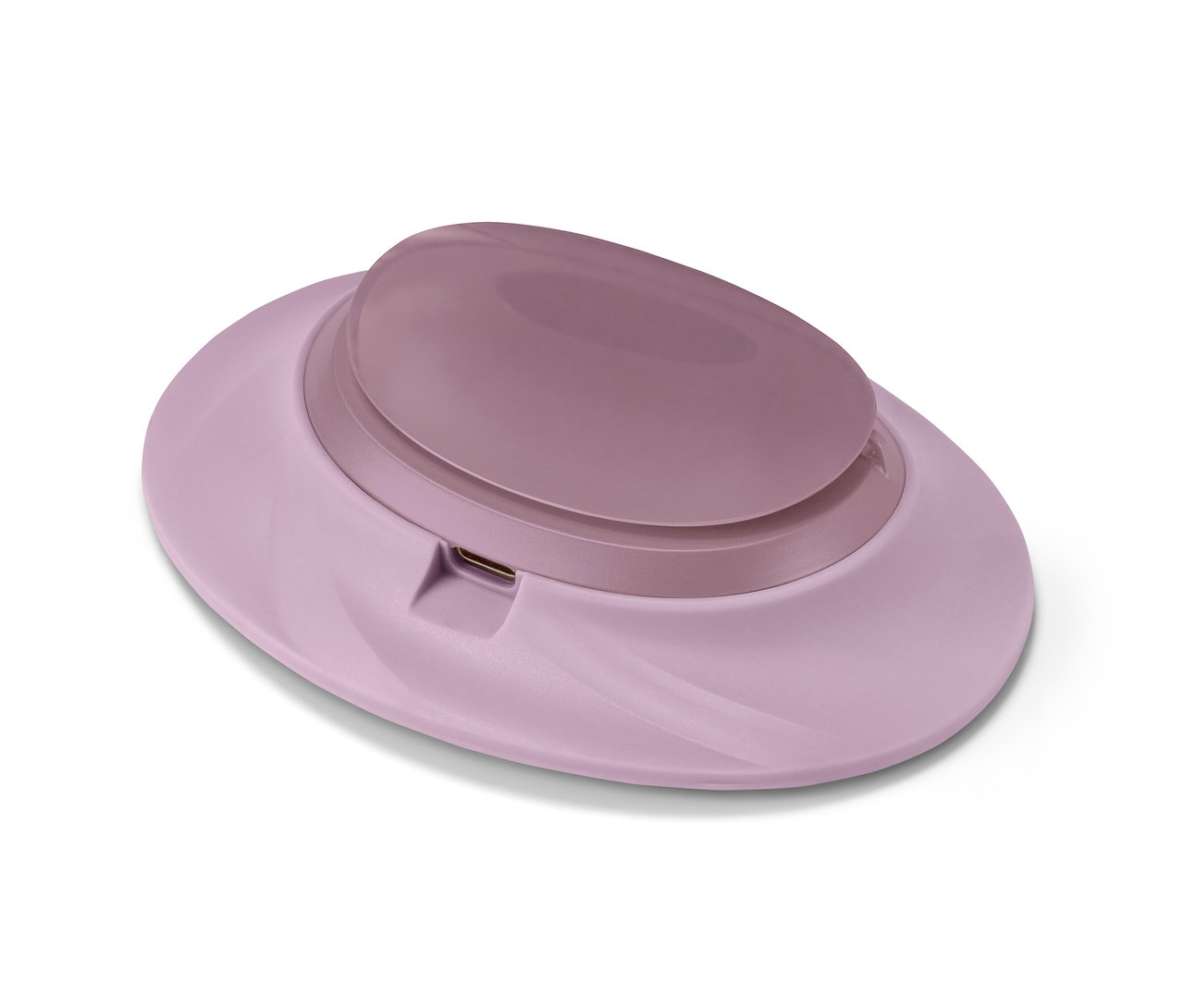 Ein hellrosa Akku-Bauchwärmer auf einem weißen Hintergrund.