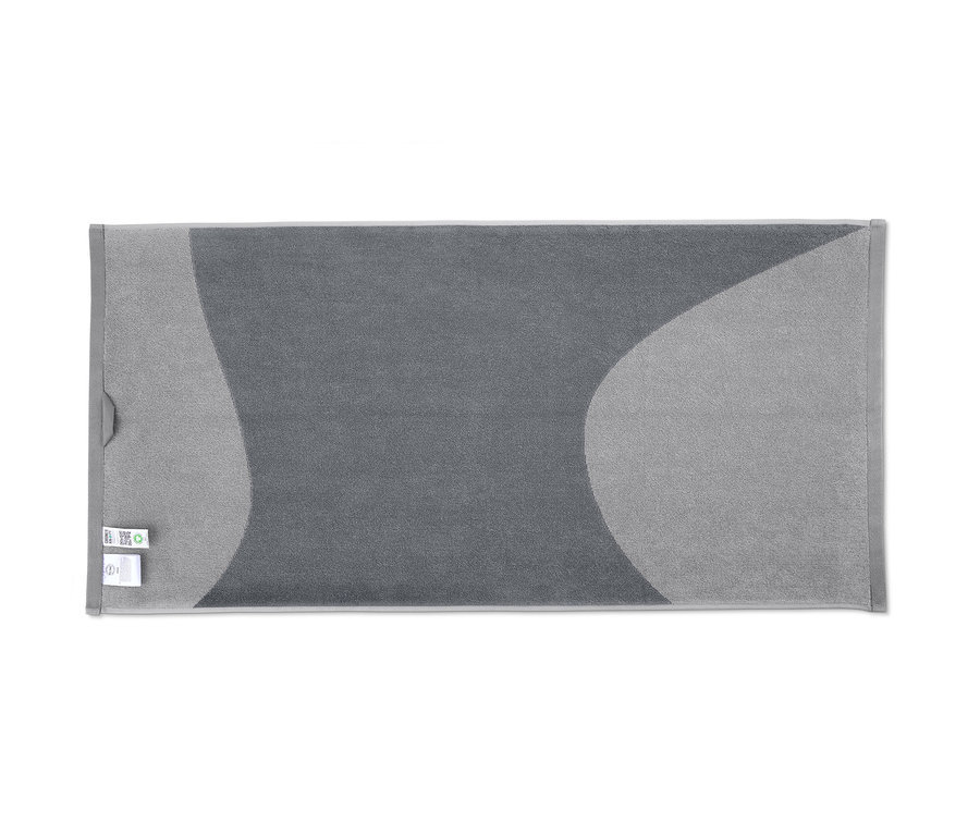 Zwei graue Jacquard-Handtücher mit abstraktem Muster.