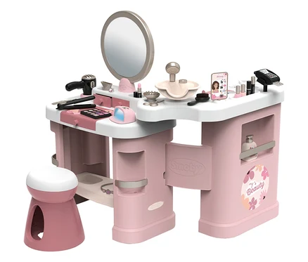 Rosa-weißer Schminktisch mit Spiegel, Hocker und Zubehör wie Fön, Make-up und Handy.