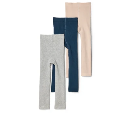 Drei Kinderleggings in Grau, Dunkelblau und Beige liegen übereinander auf einem weißen Hintergrund.