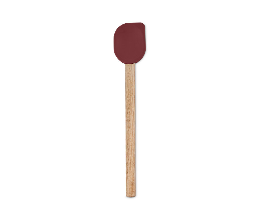 Ein roter Küchenspatel mit Holzgriff.