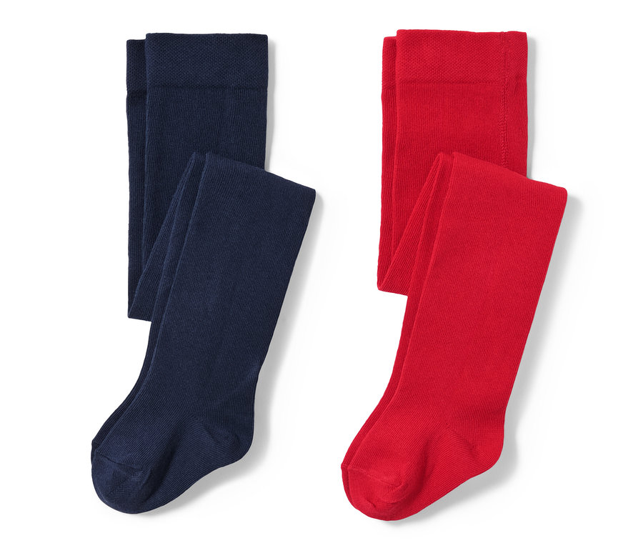 Zwei Kinder-Strumpfhosen: eine dunkelblaue und eine rote.