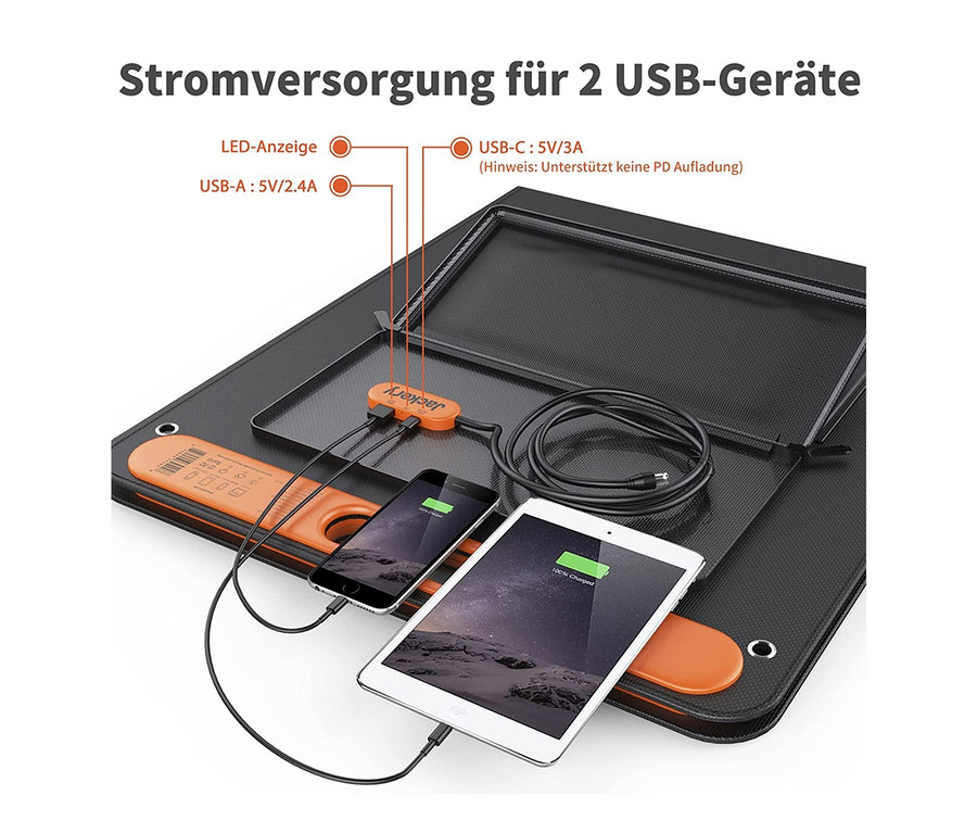 Schwarzes Jackery »Explorer 240« und »SolarSaga 100« Solarpanel lädt Handy und Tablet.
