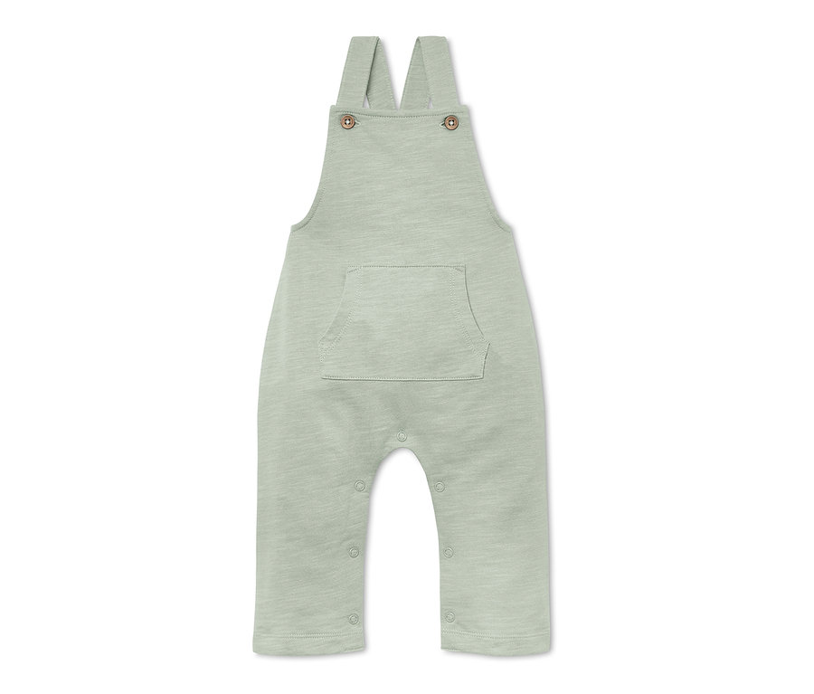 Eine hellgrüne Baby-Latzhose mit einer Tasche in der Mitte.
