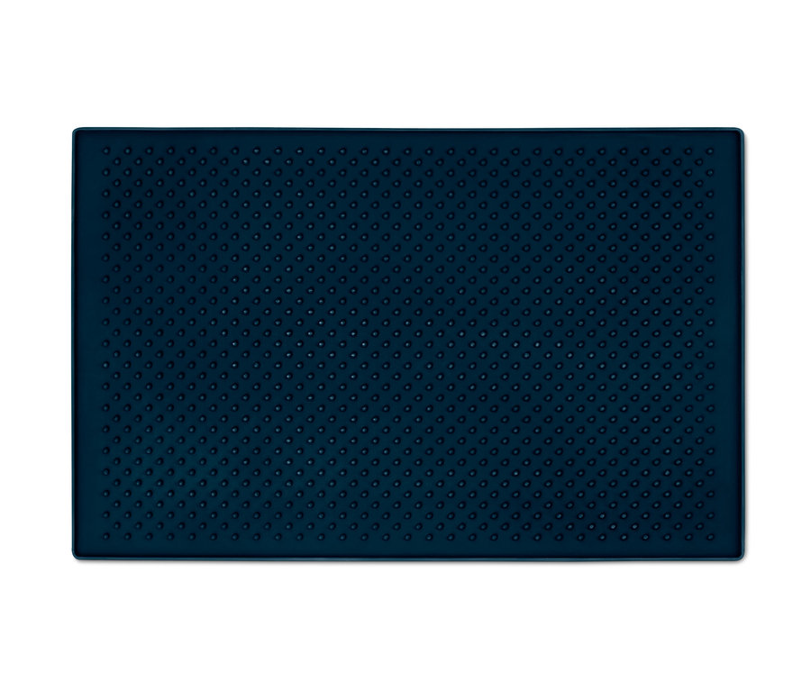 Nahaufnahme eines blauen Futternapf-Untersetzers mit Noppen.