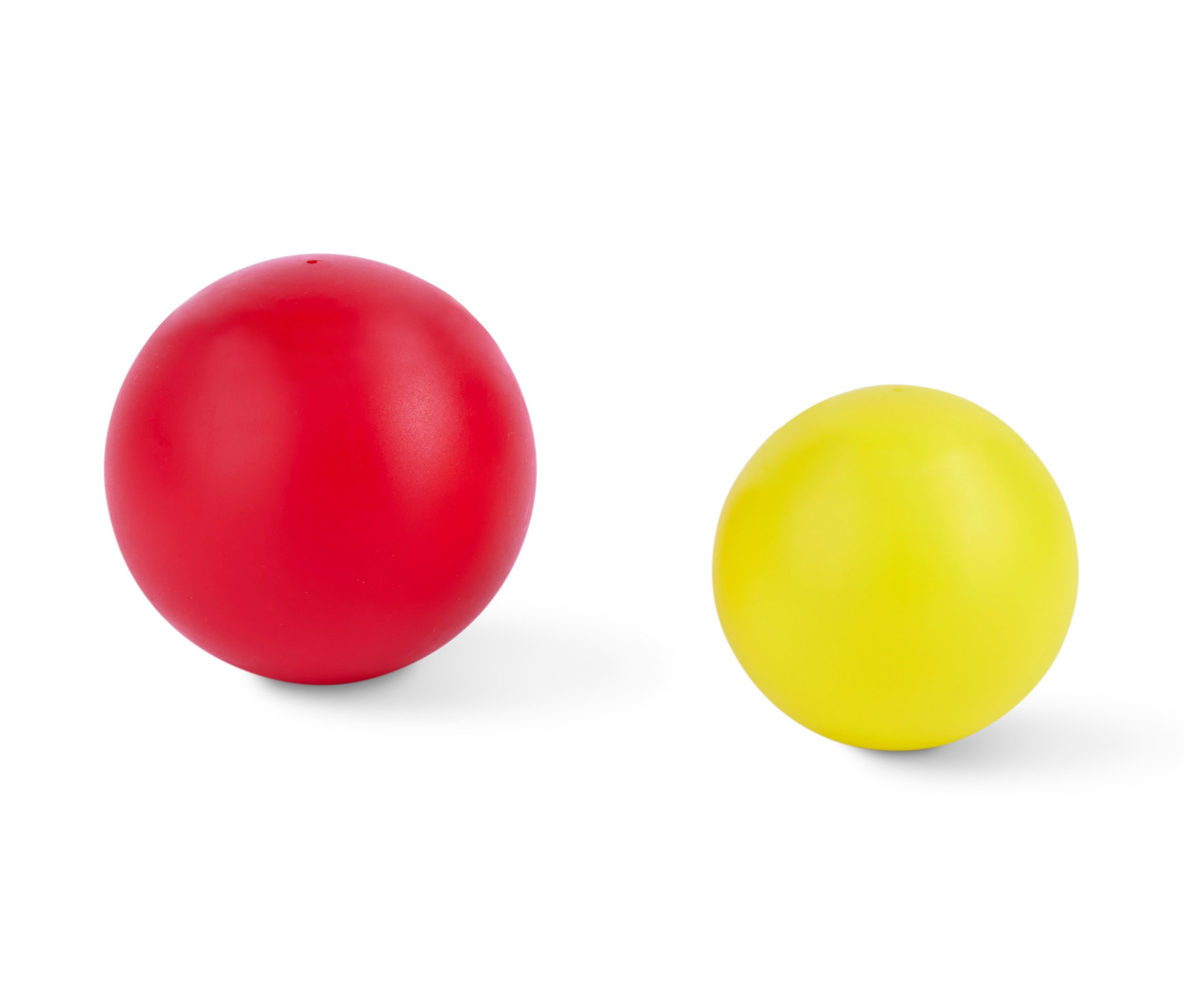 Zwei Hunde-Spielzeugbälle, einer rot und einer gelb.