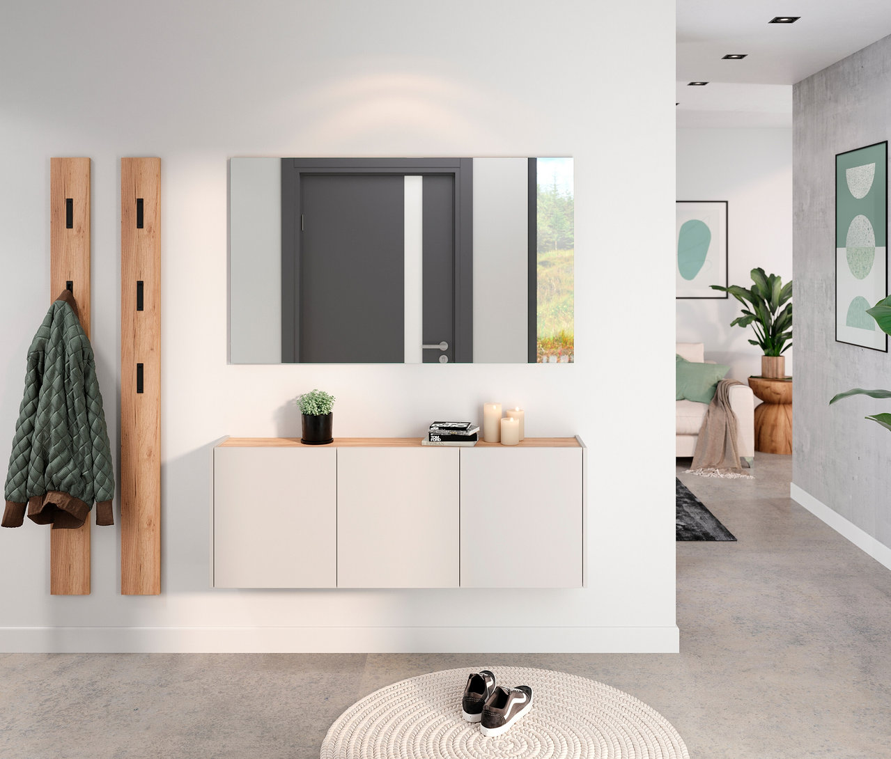 Eingangsbereich mit dem Spiegel »Libbiano«, Garderobe, Bank und rundem Teppich.