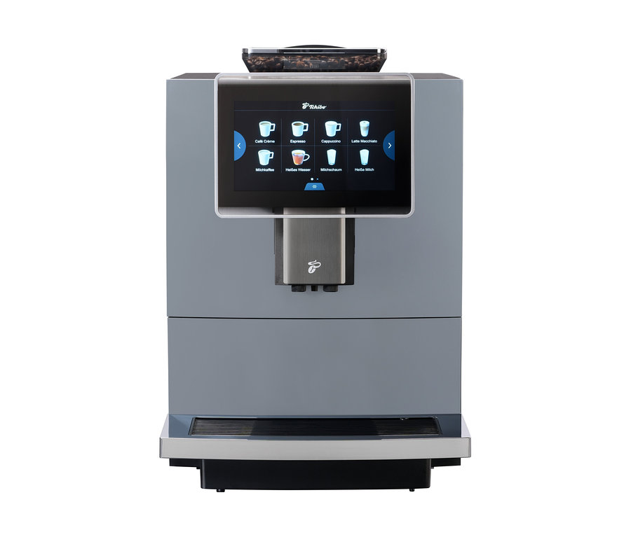 Grauer Profi-Kaffeevollautomat »Tchibo Office« inklusive Wasserfilter mit Touchscreen-Bedienfeld und verschiedenen Kaffeeauswahlmöglichkeiten.